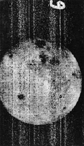 Luna 3 using a 200mm lens at 50,000km  onto 35 mm aerial-reconnaissance film (obtained from American spy balloons