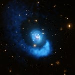 What looks like blue light and hot gas but isn’t? Credit: X-ray: NASA/CXC/BU/E.Blanton; Optical: ESO/VLT