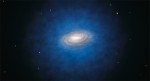 This artist’s impression shows the Milky Way galaxy surrounded by impressionistic dark matter. Credit: ESO/L. Calçada