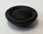 Australite in flanged button shape, backside, diameter 20 millimetres, weight 3.5 grams. Courtesy Herbert Raab (2006).