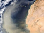 Satellite image showing a cloud of Saharan sand blown off the west coast of Africa. Credit: NASA.