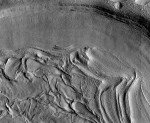 Unnamed crater with “concentric fill” in the northern Martian highlands. Credit: NASA/HiRISE.