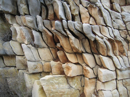 Strangely fractured rock strata near Guadalest, Spain