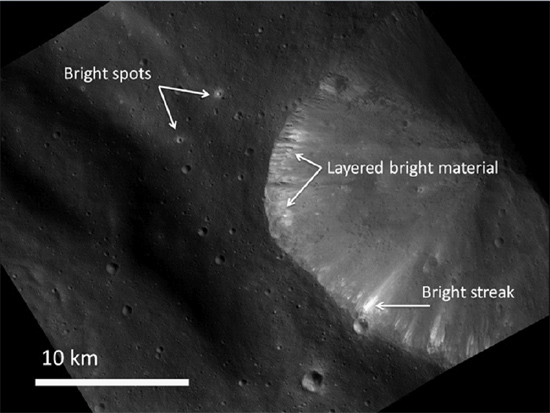 Reflective spots and streaks on Vesta