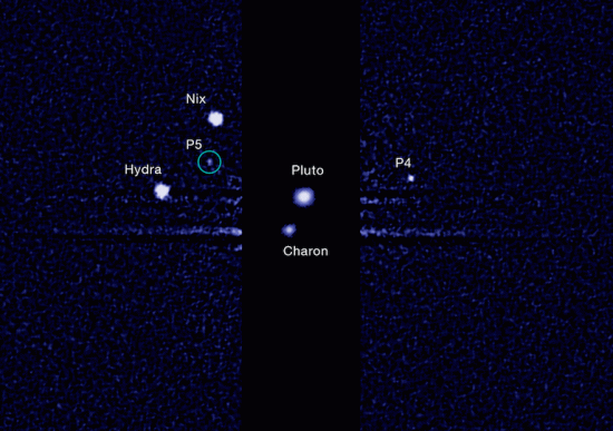 Pluto and its five moons are considered to be Kuiper Belt Objects.Credit: NASA, ESA, and M. Showalter (SETI Institute)