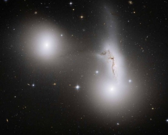 Three interacting galaxies: NGC 7173 (middle left), NGC 7174 (middle right), and NGC 7176 (lower right). Credit: NASA, ESA, and R. Sharples (University of Durham)