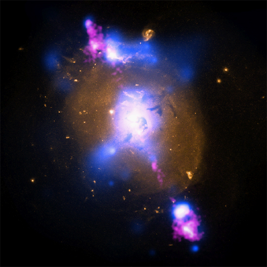 Axial discharge from a galaxy’s central plasmoid emits high-energy X-ray and radio “light.”Credit: X-ray: NASA/CXC/SAO/A.Siemiginowska et al; Optical: NASA/STScI; Radio: NSF/NRAO/VLA