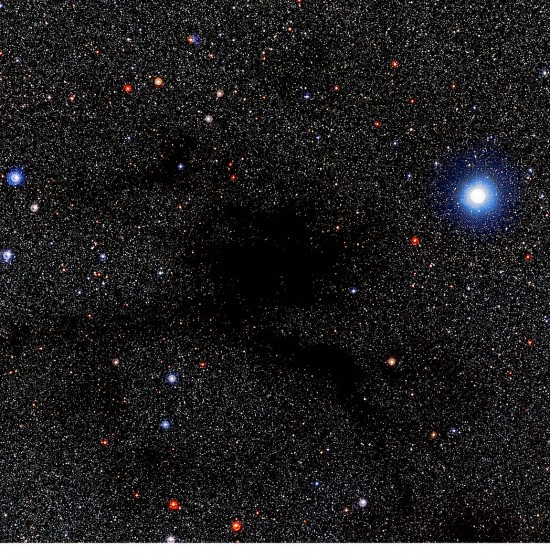 Lynds Dark Nebula 483 is located about 700 light-years away in the constellation of Serpens (The Serpent). Credit: ESO