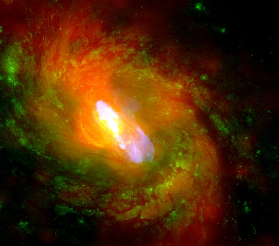 NGC 1068 (a.k.a. M77). Credit: X-ray (NASA/CXC/MIT/C.Canizares, D.Evans et al), Optical (NASA/STScI), Radio (NSF/NRAO/VLA)